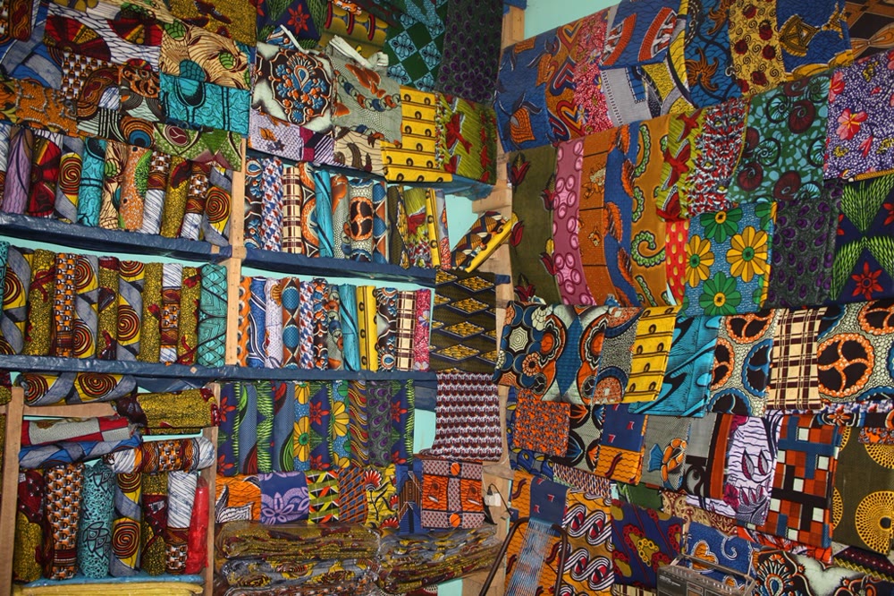 Colorful fabric shop with hundreds of bold print bolts